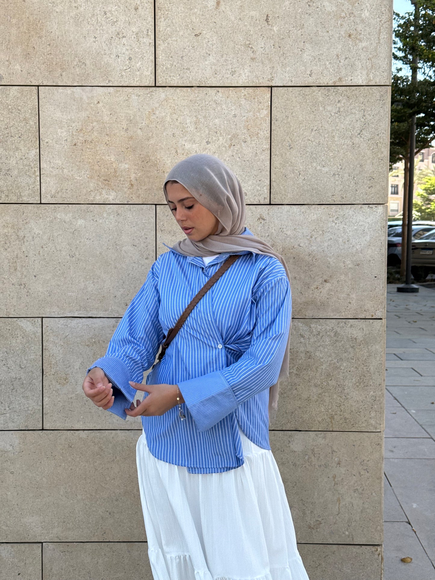 THE DAILY STRIPED SHIRT in light blue .