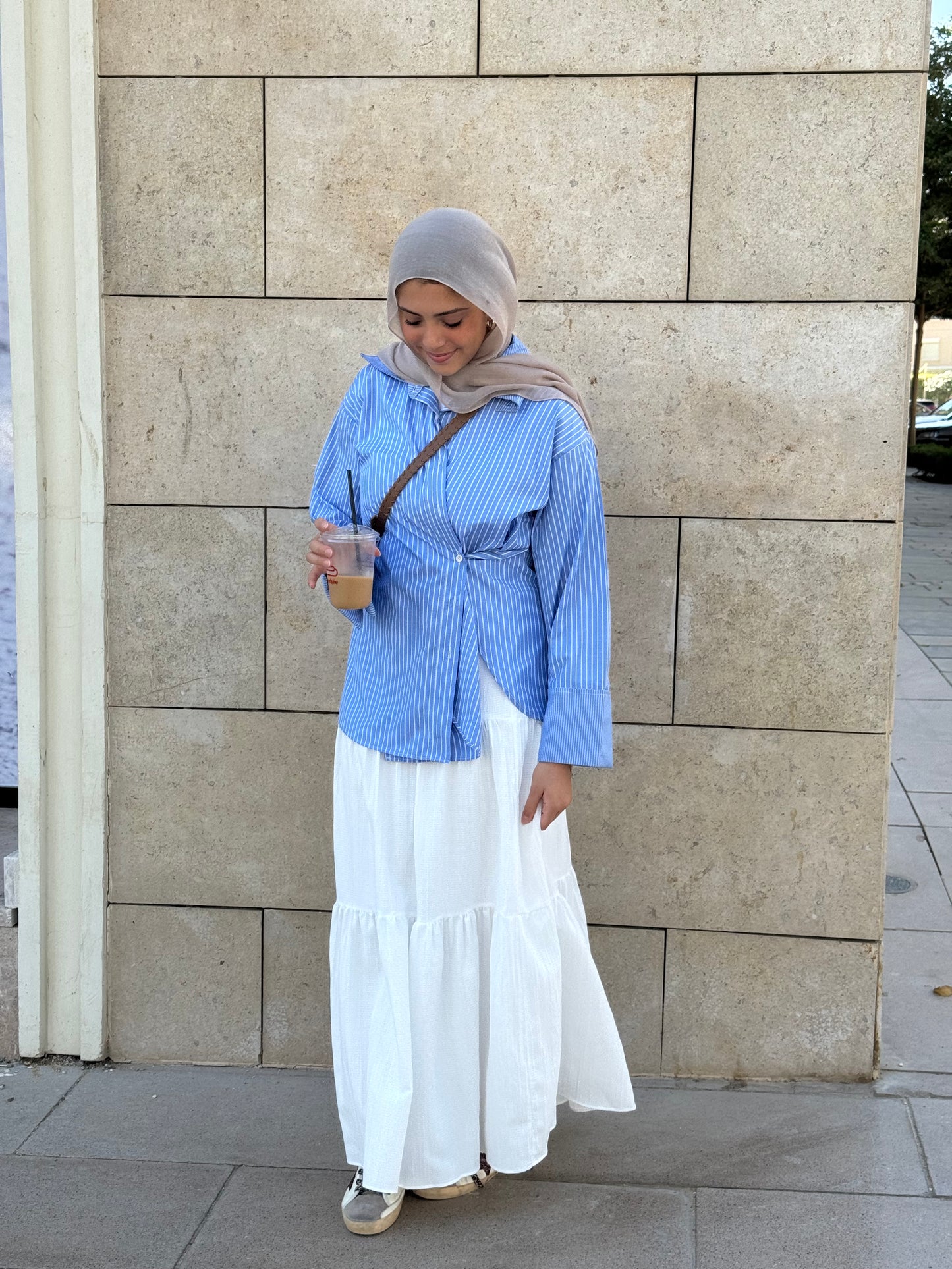 THE DAILY STRIPED SHIRT in light blue .